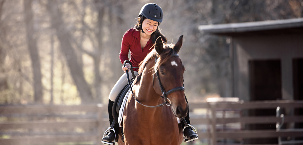 Woman riding horse